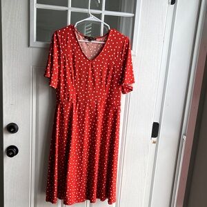 Women’s orange and white polka dot dress